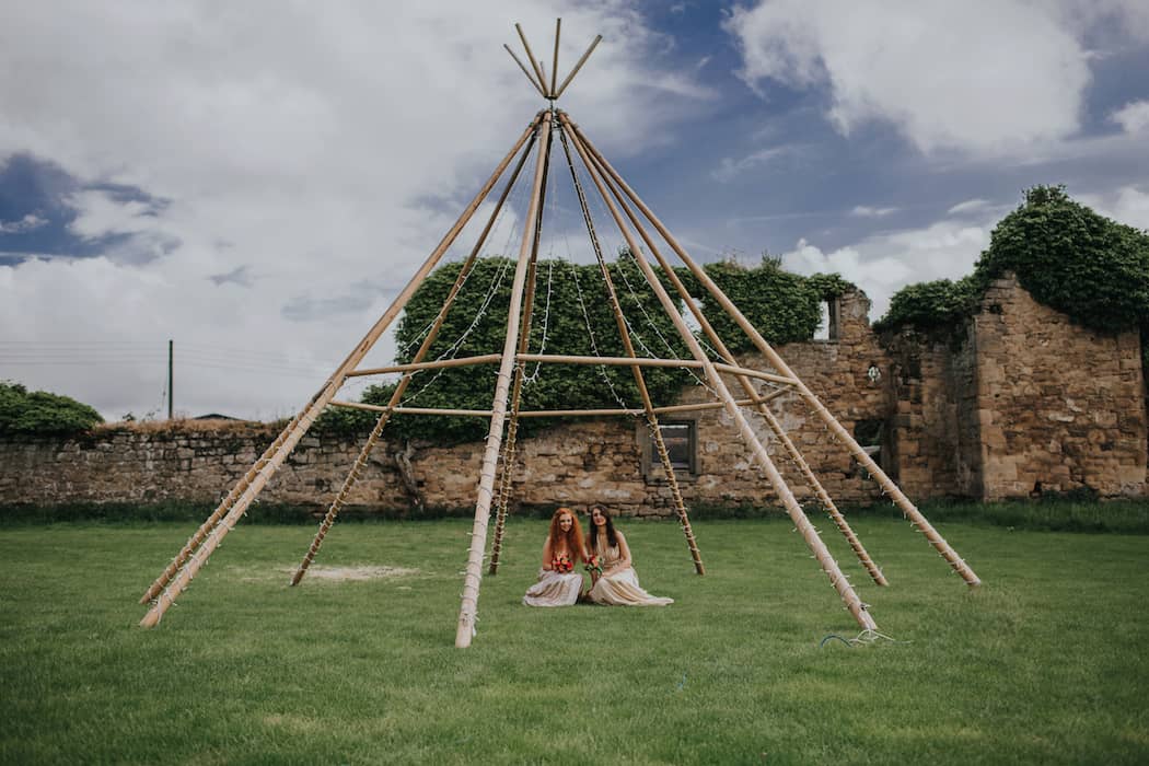 Naked Tipi with fairy lights - ideal for a ceremony back drop or alfresco dining space with a little extra WOW