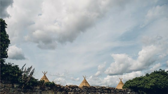 Image by Matt Brown Three giant hat tipis