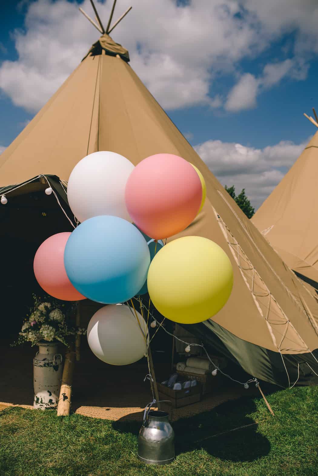 Giant Balloons creating a statement entrance to bawdon lodge farm tipi wedding celebration
