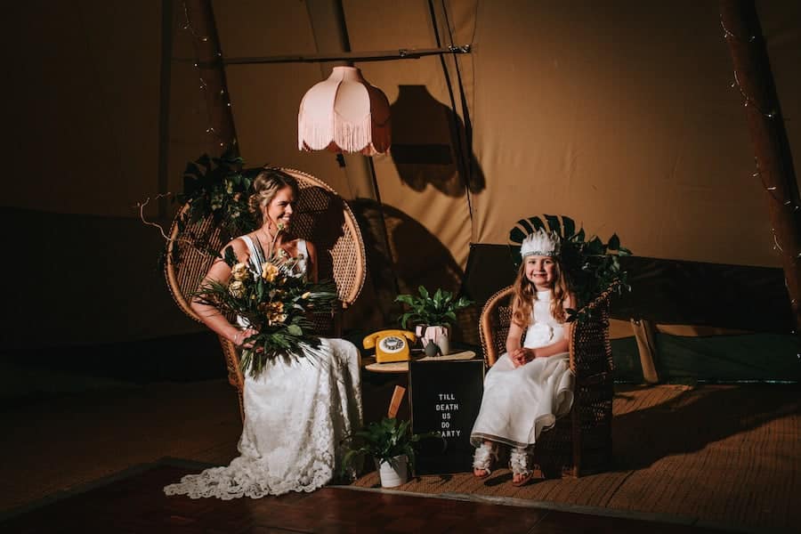 Sunflowers and Colourful tipi wedding celebration Industrial meets botanical tipi styling inspiration