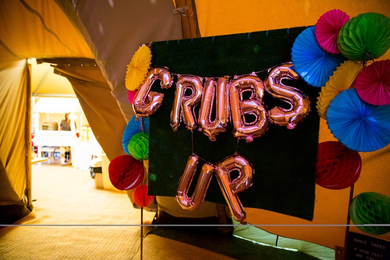 Grubs Up playful balloon backdrop for food display