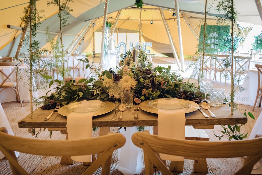 Tipi Styling with swing top table and lots of greenery Tipi Styling with swing top table and lots of greenery