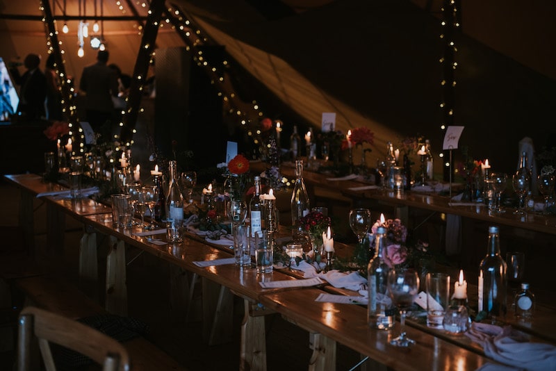 table decorations night time showing off fairy lights in Tipi 