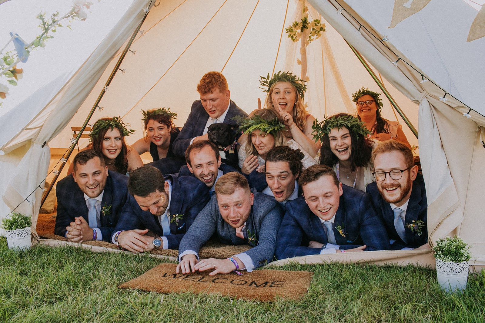 Bridal party crashing the glamping tent cattows farm wedding with sami tipi