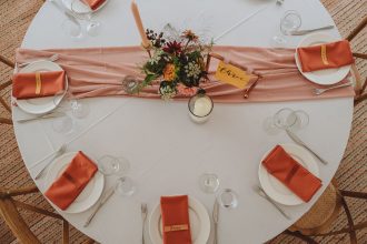5'6 Round Table setup in Sailcloth Tent with seating for 8 guests