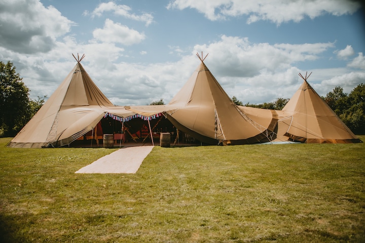 Two giant hat tipis with chill-out tipi