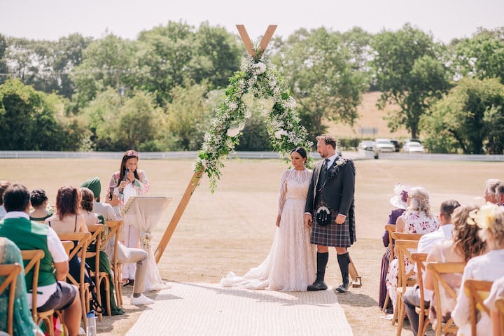 Ceremony Arch as a floral back drop and walkway focal point