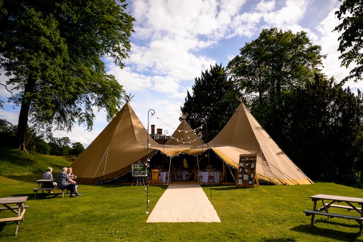Three giant hat Tipi wedding set up at Whitmore Hall Staffordshire