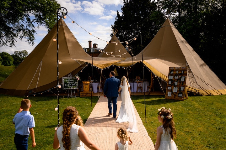 Three Giant hat Tipi wedding celebration at Whitmore Hall staffordshire